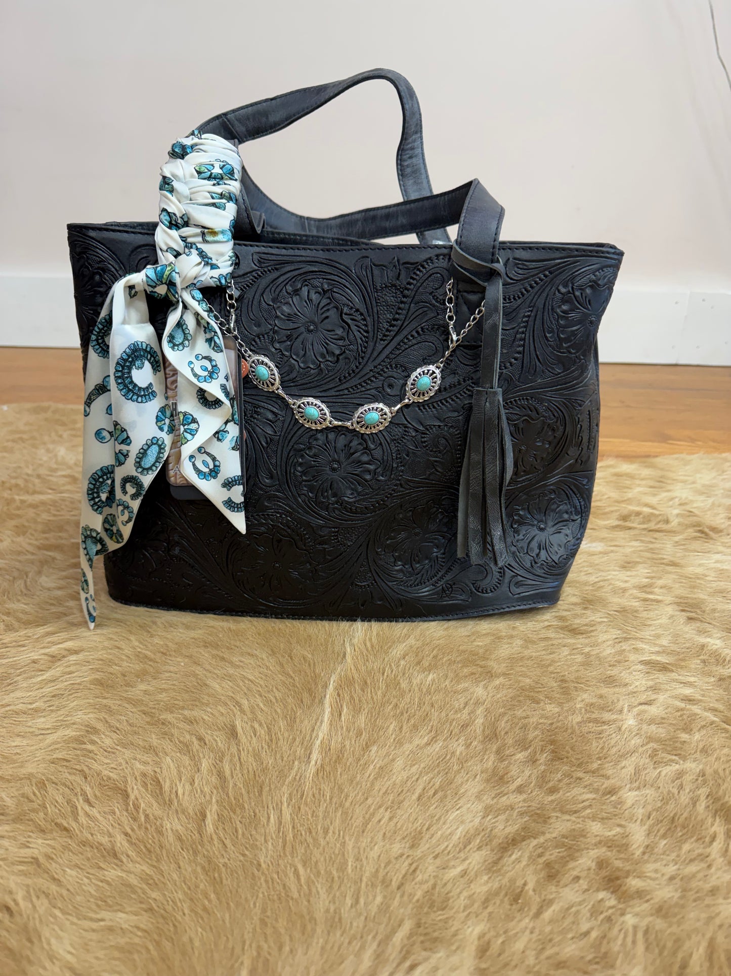 THE BAILEY TOOLED LEATHER HAND BAG
