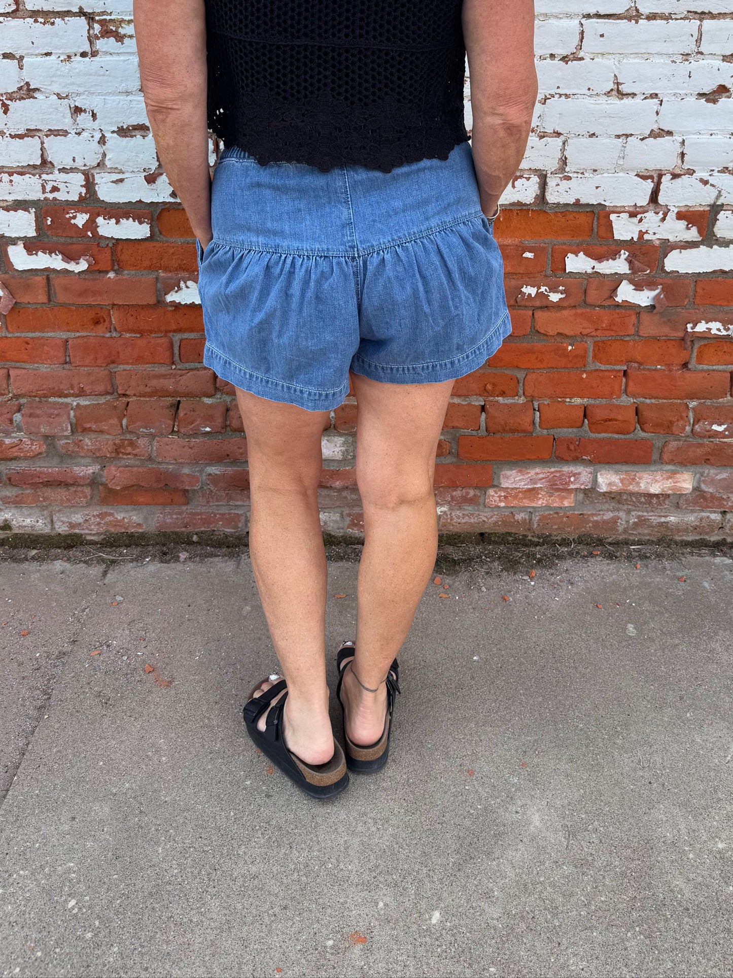 PLEATED DENIM SHORTS