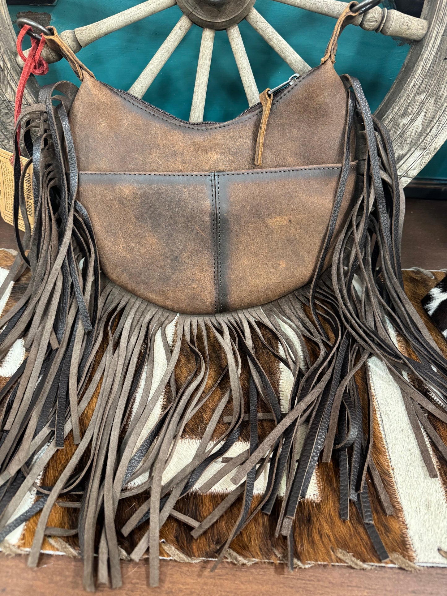 COWHIDE NELLIE FRINGE BAG