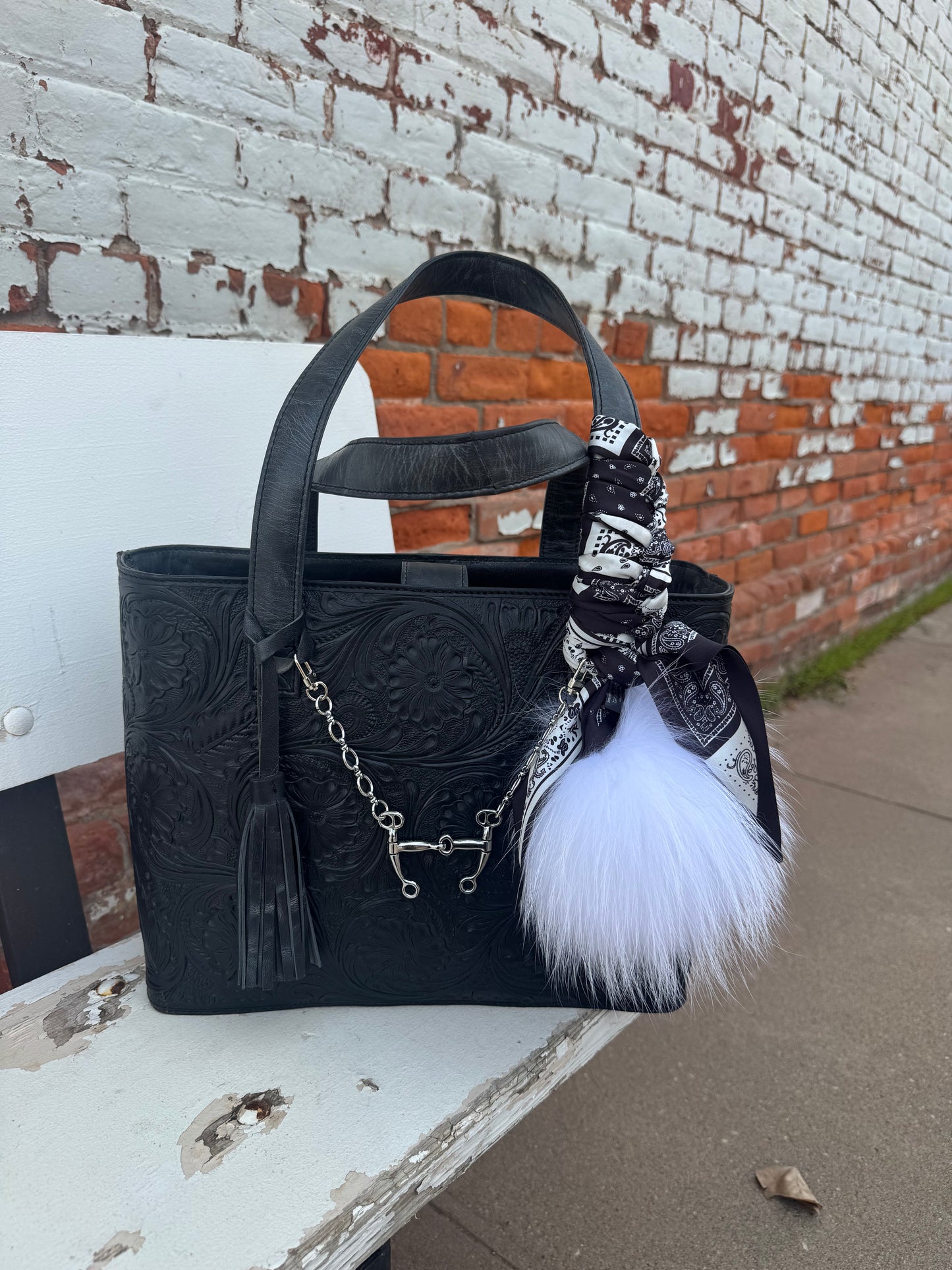 THE BRITTNEY TOOLED LEATHER HAND BAG