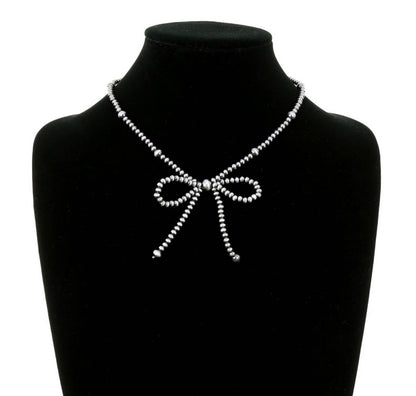 NAVAJO STYLE PEARL BOW NECKLACE