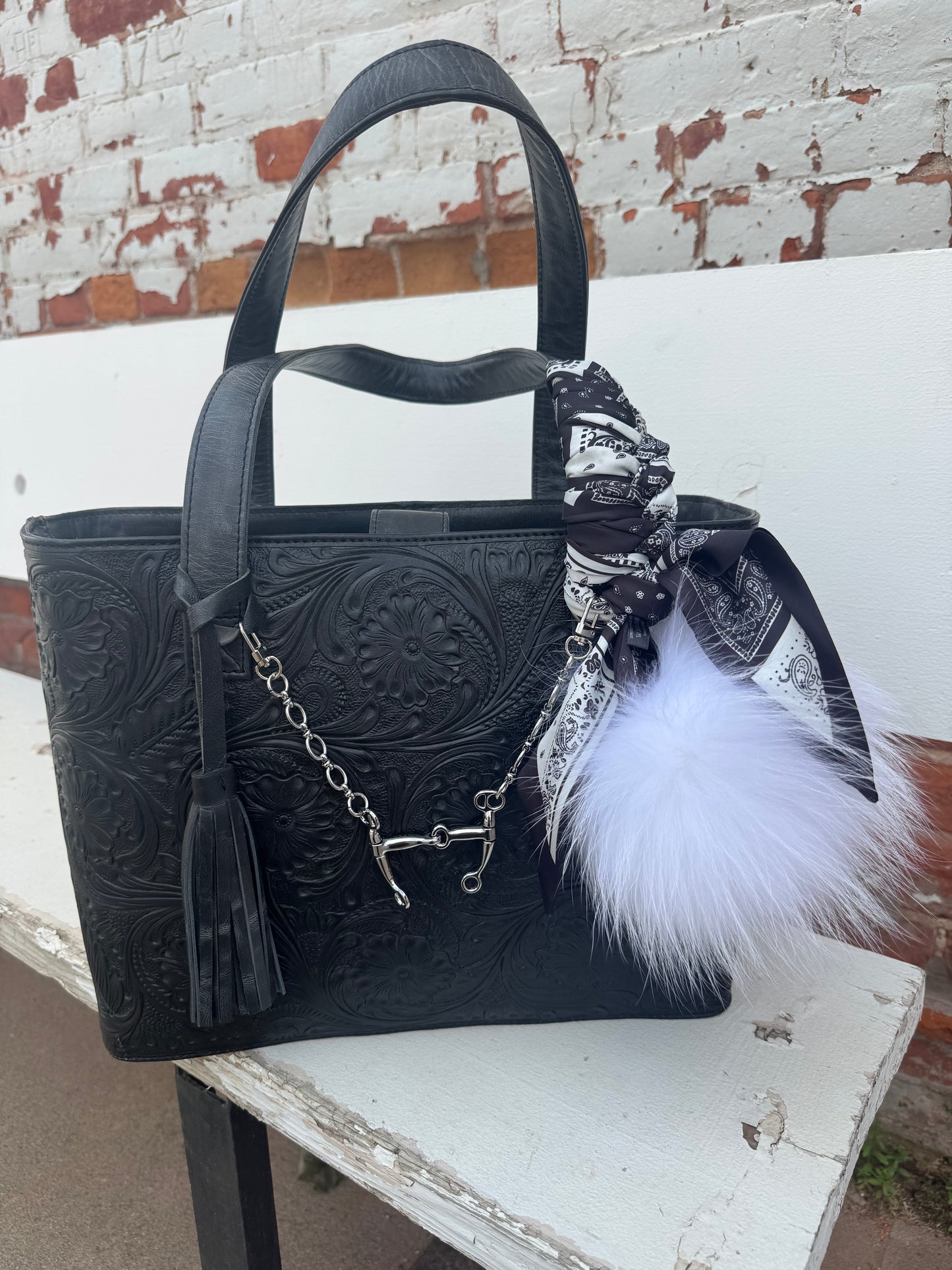 THE BRITTNEY TOOLED LEATHER HAND BAG