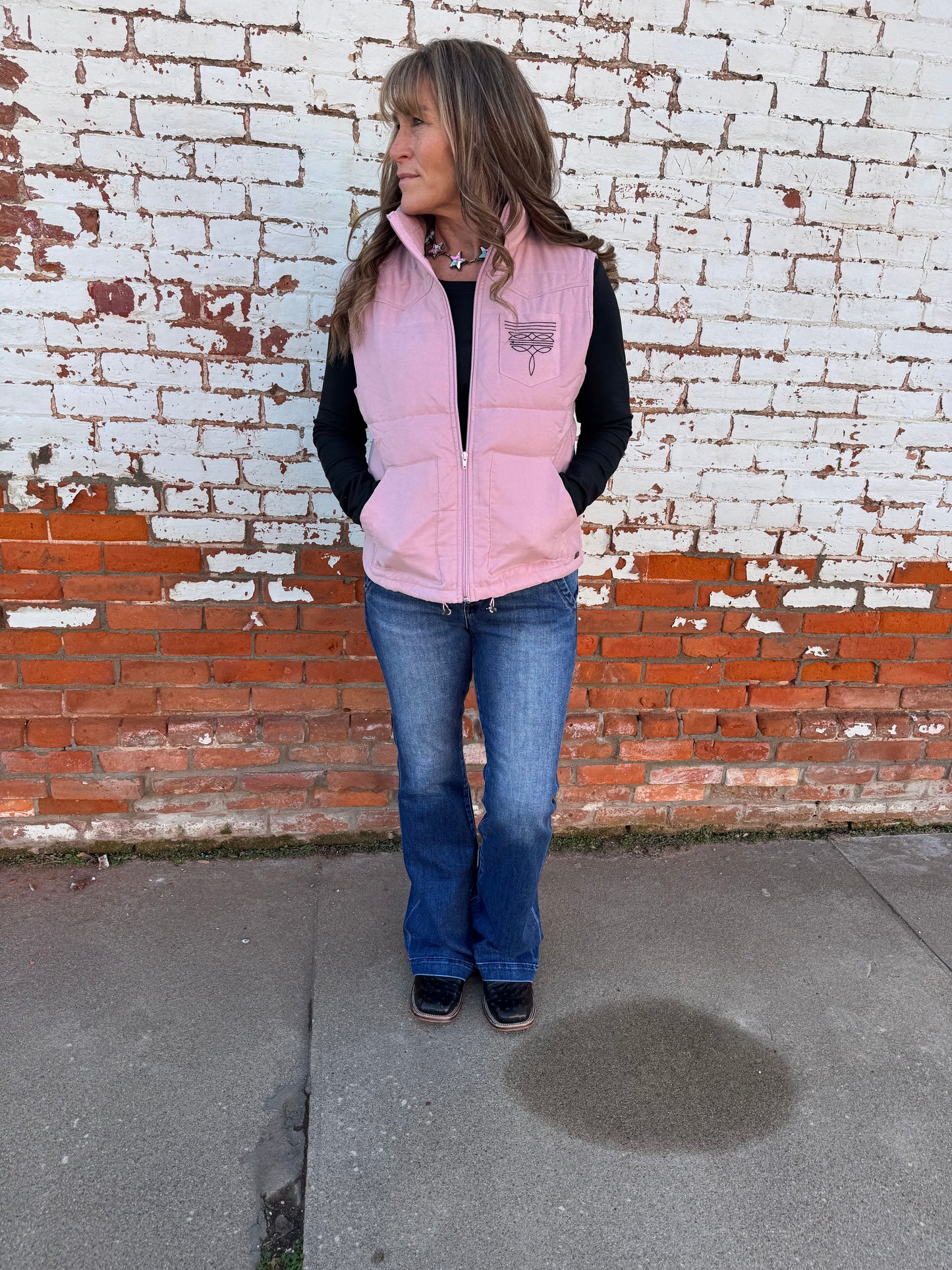 PUFFER VEST WITH BOOT STITCH DETAIL