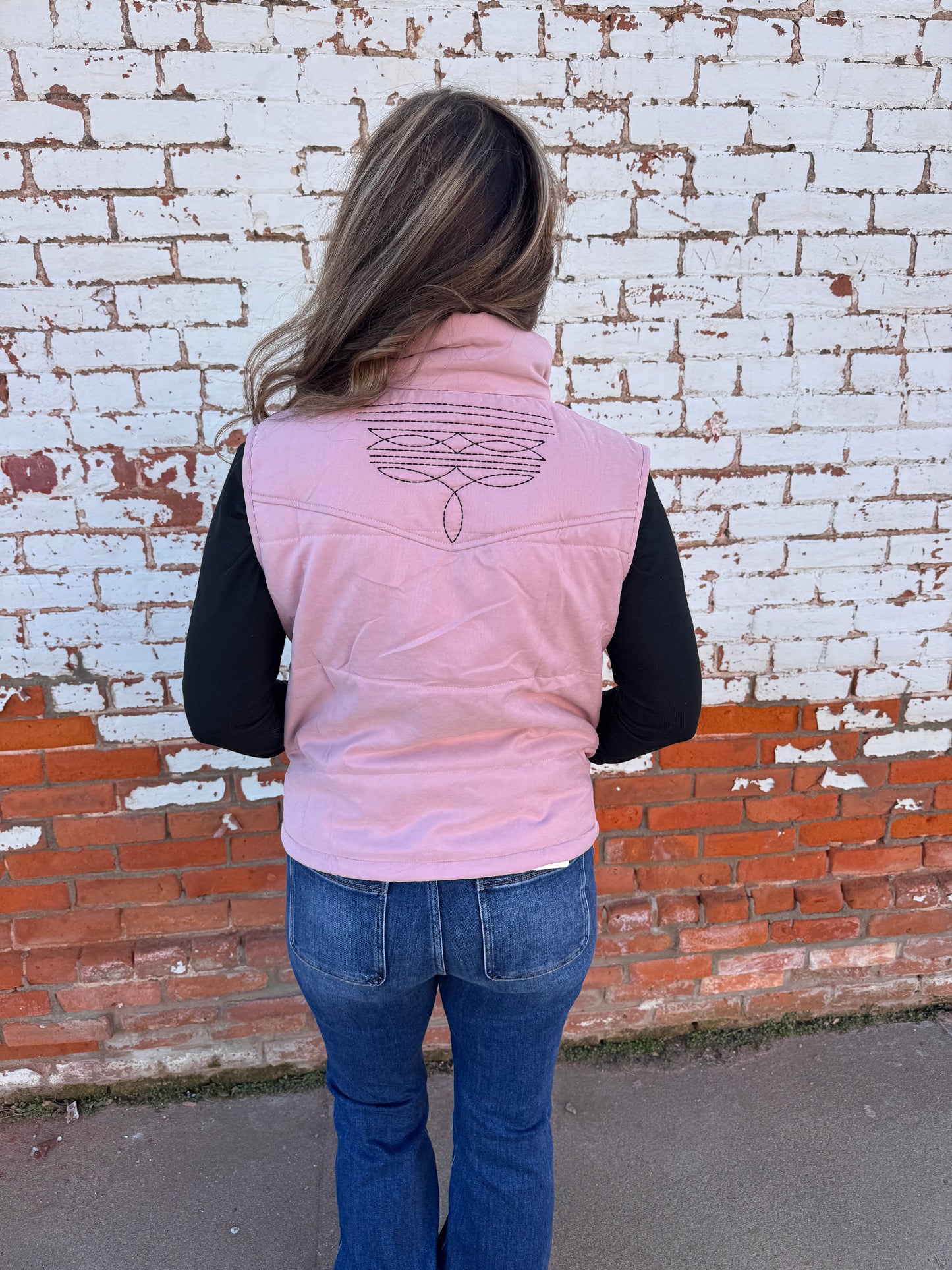 PUFFER VEST WITH BOOT STITCH DETAIL